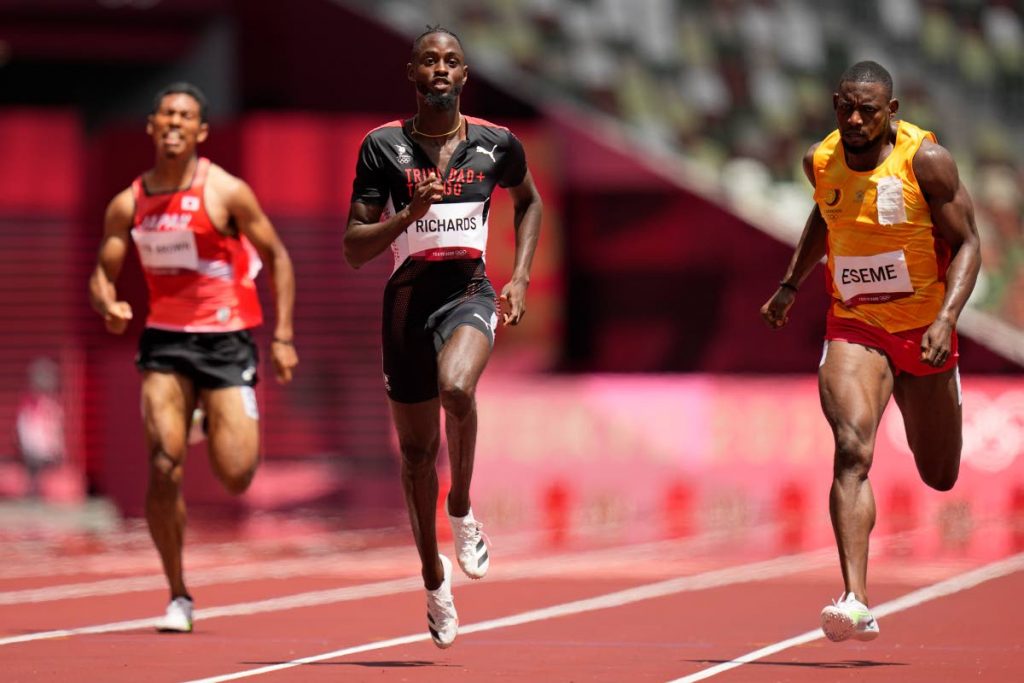 Tokyo Olympics : Jereem Richards (centre), men's 200m