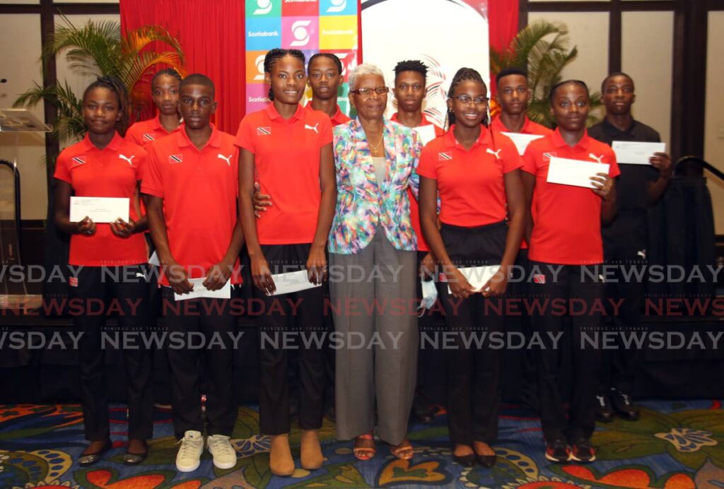 Meets & Features : Crispina Edmund (M) mother of late Olympian Deon Lendore, with ten Deon Lendore Bursary junior athletes Hilton Hotel